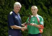 8 September 2005; Liam Kearney, Cork City, is presented with the eircom / Soccer Writers Association of Ireland Player of the Month award for August by Republic of Ireland U21 manager Don Givens. Rochestown Park Hotel, Cork. Picture credit; Pat Murphy / SPORTSFILE