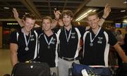 7 September 2005; Members of the Men's Lightweight Four LM4 Irish Rowing Team, who won a silver medal at the World Championships at Japan, on their arrival at Dublin Airport, left to right, Tim Harnedy, Skibbereen, Paul Griffin, Muckross, Eugene Coakley, Skibbereen, Richard Archibald, Queens University. Dublin Airport, Dublin. Picture credit; Ray McManus / SPORTSFILE