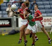 10 September 2005; Regina Curtin, Cork, supported by team-mate Juliette Murphy, right, in action against Christina Heffernan, Mayo. TG4 Ladies Senior Football All-Ireland Championship Semi-Final, Cork v Mayo, O'Moore Park, Portlaoise, Co. Laois. Picture credit; Damien Eagers / SPORTSFILE