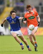 29 May 2016; Ross McQuillan of Armagh is tackled by Luke Fortune of Cavan in the Electric Ireland Ulster GAA Football Minor Championship quarter-final between Cavan and Armagh in Kingspan Breffni Park, Cavan. Photo by Oliver McVeigh/Sportsfile