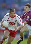 17 July 2004; Philip Jordan, Tyrone, in action against Damien Burke, Galway. Bank of Ireland Senior Football Championship Qualifier, Round 3, Tyrone v Galway, Croke Park, Dublin. Picture credit; Ray McManus / SPORTSFILE