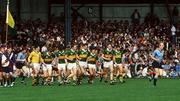 22 September 1985; Dublin's Brian Mullins, right and the Kerry players leave the pre-match parade before the start of the game. Kerry v Dublin, All-Ireland Football Final, Croke Park, Dublin. Picture credit; Ray McManus / SPORTSFILE