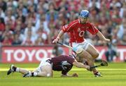 11 September 2005; Tom Kenny, Cork, in action against Fergal Healy, Galway. Guinness All-Ireland Senior Hurling Championship Final, Galway v Cork, Croke Park, Dublin. Picture credit; Brendan Moran / SPORTSFILE *** Local Caption *** Any photograph taken by SPORTSFILE during, or in connection with, the 2005 Guinness All-Ireland Hurling Final which displays GAA logos or contains an image or part of an image of any GAA intellectual property, or, which contains images of a GAA player/players in their playing uniforms, may only be used for editorial and non-advertising purposes.  Use of photographs for advertising, as posters or for purchase separately is strictly prohibited unless prior written approval has been obtained from the Gaelic Athletic Association.