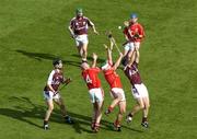 11 September 2005; Cork pair Brian Corcoran, 14, and Niall McCarthy contest a dropping ball with Shane Kavanagh, right and Tony Og Regan. Ollie Canning, Galway, and Kieran Murphy, Cork, await the breaking ball. Guinness All-Ireland Senior Hurling Championship Final, Galway v Cork, Croke Park, Dublin. Picture credit; Damien Eagers / SPORTSFILE *** Local Caption *** Any photograph taken by SPORTSFILE during, or in connection with, the 2005 Guinness All-Ireland Hurling Final which displays GAA logos or contains an image or part of an image of any GAA intellectual property, or, which contains images of a GAA player/players in their playing uniforms, may only be used for editorial and non-advertising purposes.  Use of photographs for advertising, as posters or for purchase separately is strictly prohibited unless prior written approval has been obtained from the Gaelic Athletic Association.