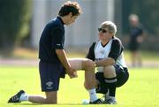 14 September 2005; Alan Bennett, Cork City, receives treatment from team doctor Gerard Murphy during squad training in advance of their 2005 UEFA Cup First Round, First Leg tie with Slavia Prague. Slavia Prague training complex, Prague, Czech Republic. Picture credit: David Maher / SPORTSFILE