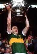 21 September 1986; Kerry captain Tommy Doyle lifts the Sam Maguire Cup. Kerry v Tyrone, All-Ireland Football Final, Croke Park, Dublin. Picture credit; Ray McManus / SPORTSFILE