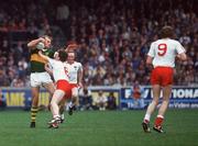 21 September 1986; Jack O'Shea, Kerry, is tackled by Noel McGinn (6), Tyrone. Kerry v Tyrone, All-Ireland Football Final, Croke Park, Dublin. Picture credit; Ray McManus / SPORTSFILE