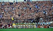 22 September 1985; The Kerry and Dublin teams march in front of Hill 16 during the pre-match parade. Kerry v Dublin, All-Ireland Football Final, Croke Park, Dublin. Picture credit; Ray McManus / SPORTSFILE