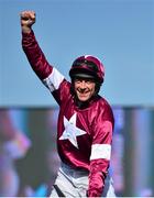 14 March 2014; Davy Russell celebrates after winning the JCB Triumph Hurdle on Tiger Roll. Cheltenham Racing Festival 2014, Prestbury Park, Cheltenham, England. Picture credit: Barry Cregg / SPORTSFILE