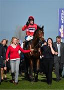 14 March 2014; Lac Fontana, with Daryl Jacob up, is led into the winners enclosure after victory in the Vincent O'Brien County Handicap Hurdle. Cheltenham Racing Festival 2014, Prestbury Park, Cheltenham, England. Picture credit: Ramsey Cardy / SPORTSFILE