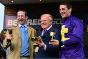 14 March 2014; Jockey Davy Russell with trainer Jim Culloty, left, and owner Dr. Ronan Lambe, holds the Gold Cup after winning the BetFred Cheltenham Gold Cup Chase on Lord Windermere. Cheltenham Racing Festival 2014, Prestbury Park, Cheltenham, England. Picture credit: Barry Cregg / SPORTSFILE