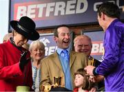 14 March 2014; Trainer Jim Culloty, centre, jokes with  Princess Anne, left, owner Dr. Ronan Lambe, and jockey Davy Russell after winning the BetFred Cheltenham Gold Cup Chase with Lord Windermere. Cheltenham Racing Festival 2014, Prestbury Park, Cheltenham, England. Picture credit: Barry Cregg / SPORTSFILE