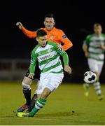 14 March 2014; Luke Byrne, Shamrock Rovers, in action against Sean Brennan, Athlone Town. Airtricity League Premier Division, Athlone Town v Shamrock Rovers, Athlone Town Stadium, Athlone, Co. Westmeath. Photo by Sportsfile