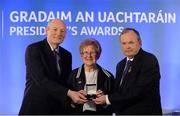 14 March 2014; Mary Wheatley, Crettyard, Laois, is presented with her GAA President's Awards for 2014 Ladies Football award by Uachtarán Chumann Lúthchleas Gael Liam Ó Néill and Denis O’Callaghan, AIB, Head of Branch Banking, left. Mary Wheatley's involvement in Ladies Football stretches across every level of the Association starting as it did with her club Crettyard before advancing to occupy the highest position as overall Association President between 1988 and 1991. Mary has also been heavily involved at Provincial level occupying a number of key roles. She is a current member of the Management Committee of the Ladies Gaelic Football Association. Picture credit: Pat Murphy / SPORTSFILE