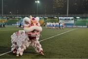 14 March 2014; A traditional Chinese Lion Dance is performed during half-time of the Exhibition match as the teams look on. 2014 TG4 Ladies Football All-Star Tour, 2012 Allstars v 2013 Allstars Exhibition match, Hong Kong Football Club, Hong Kong, China. Picture credit: Brendan Moran / SPORTSFILE
