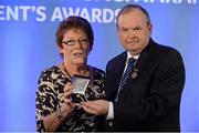 14 March 2014; Maureen Lynch, Mohill, Co Leitrim, is presented with her GAA President's Awards for 2014 award by Uachtarán Chumann Lúthchleas Gael Liam Ó Néill. Maureen Lynch has had a long and distinguished career serving the GAA through her club Mohill, Co Leitrim. While particularly active with Scór and Scór na nÓg, she has also amassed vast experience in a variety of administrative roles working on behalf of her club in whatever way required while feeding into a proud family tradition. Picture credit: Pat Murphy / SPORTSFILE
