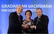 14 March 2014; Maureen Lynch, Mohill, Co Leitrim, is presented with her GAA President's Awards for 2014 award by Uachtarán Chumann Lúthchleas Gael Liam Ó Néill and Denis O’Callaghan, AIB, Head of Branch Banking, left. Maureen Lynch has had a long and distinguished career serving the GAA through her club Mohill, Co Leitrim. While particularly active with Scór and Scór na nÓg, she has also amassed vast experience in a variety of administrative roles working on behalf of her club in whatever way required while feeding into a proud family tradition. Picture credit: Pat Murphy / SPORTSFILE