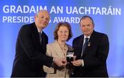 14 March 2014; Maureen Kincaid, Shamrocks, Offaly, is presented with her GAA President's Awards for 2014 award by Uachtarán Chumann Lúthchleas Gael Liam Ó Néill and Denis O’Callaghan, AIB, Head of Branch Banking, left. Maureen Kincaid first developed an interest in the GAA through involvement in camogie while in school in Ballymahon before going onto win county junior medals with Milltown and representing Westmeath. A successful move into coaching and administration followed and she has served as Secretary of Shamrocks and County Development Officer. She continues to assist on match days at O’Connor Park. Picture credit: Pat Murphy / SPORTSFILE