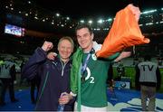 15 March 2014; Ireland head coach Joe Schmidt and Jonathan Sexton following their victory. RBS Six Nations Rugby Championship 2014, France v Ireland. Stade De France, Saint Denis, Paris, France. Picture credit: Stephen McCarthy / SPORTSFILE
