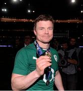 15 March 2014; Brian O'Driscoll, Ireland, shows off his six nations championship medal on the occasion of his final appearance for Ireland. RBS Six Nations Rugby Championship 2014, France v Ireland, Stade De France, Saint Denis, Paris, France. Picture credit: Matt Browne / SPORTSFILE