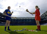 13 September 2005; Deirdre Hughes, Tipperary, left, and Elaine Burke, Cork, with the O'Duffy Cup, at a Captains Day in advance of the Foras na Gaeilge All-Ireland Senior Camogie Championship Final between Tipperary and Cork to be played on September 18th. Croke Park, Dublin. Picture credit; Pat Murphy / SPORTSFILE
