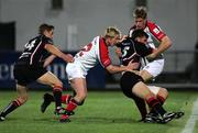 16 September 2005; Francisco Leonelli, Edinburgh, is tackled by Paul Steinmetz and Andrew Trimble, Ulster. Celtic League 2005-2006, Group A, Ulster v Edinburgh Rugby, Ravenhill, Belfast. Picture credit; Oliver McVeigh / SPORTSFILE