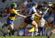 18 September 2005; Ciara Lucey, Dublin, in action against Moira McMahon, Clare. Dublin v Clare, All-Ireland Junior Camogie Final, Croke Park, Dublin. Picture credit; Brian Lawless / SPORTSFILE *** Local Caption *** Any photograph taken by SPORTSFILE during, or in connection with, the 2005 Guinness All-Ireland Hurling Final which displays GAA logos or contains an image or part of an image of any GAA intellectual property, or, which contains images of a GAA player/players in their playing uniforms, may only be used for editorial and non-advertising purposes.  Use of photographs for advertising, as posters or for purchase separately is strictly prohibited unless prior written approval has been obtained from the Gaelic Athletic Association.