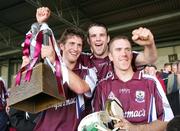 18 September 2005; Galway captain Kenneth Burke with team-mates Kevin Briscoe and David Collins celebrate with the Cashel Cross Trophy. Erin All-Ireland U21 Hurling Final, Galway v Kilkenny, Gaelic Grounds, Limerick. Picture credit; Kieran Clancy / SPORTSFILE