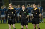 12 March 2014; Referee Martin McNally, centre, along with Sean Laverty, Linesman, left, and Ian Molloy, Standby referee, right, stand for the national anthem. Cadbury Ulster GAA Football U21 Championship, Preliminary Round, Derry v Cavan, Celtic Park , Derry. Picture credit: Oliver McVeigh / SPORTSFILE