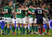 15 March 2014; Ireland players celebrate following the final whistle. RBS Six Nations Rugby Championship 2014, France v Ireland. Stade De France, Saint Denis, Paris, France. Picture credit: Stephen McCarthy / SPORTSFILE