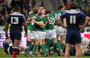 15 March 2014; Brian O'Driscoll, Ireland, celebrates with team-mate Andrew Trimble at the final whistle. RBS Six Nations Rugby Championship 2014, France v Ireland. Stade De France, Saint Denis, Paris, France. Picture credit: Stephen McCarthy / SPORTSFILE