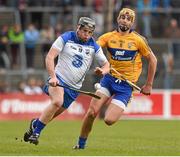 16 March 2014; Jake Dillon, Waterford, in action against Peter Duggan, Clare. Allianz Hurling League, Division 1A, Round 4, Clare v Waterford, Cusack Park, Ennis, Co. Clare. Picture credit: Ray McManus / SPORTSFILE