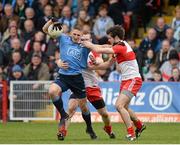 16 March 2014; Eoghan O'Gara, Dublin, in action against Fergal Doherty and Chrissy McKaigue, Derry. Allianz Football League, Division 1, Round 5, Derry v Dublin, Celtic Park, Derry. Picture credit: Oliver McVeigh / SPORTSFILE