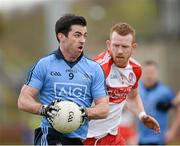 16 March 2014; Michael Darragh Macauley, Dublin, in action against Fergal Doherty, Derry. Allianz Football League, Division 1, Round 5, Derry v Dublin, Celtic Park, Derry. Picture credit: Oliver McVeigh / SPORTSFILE