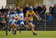 16 March 2014; Shane O'Donnell, Clare, races clear of Waterford's Noel Connors on his way to score the fifth Clare goal.. Allianz Hurling League, Division 1A, Round 4, Clare v Waterford, Cusack Park, Ennis, Co. Clare. Picture credit: Ray McManus / SPORTSFILE