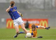 16 March 2014: Fergal Reilly, Longford, in action against Niall McDermott, Cavan. Allianz Football League Division 3, Round 5, Longford v Cavan, Pearse Park, Longford. Picture credit: Ray Lohan / SPORTSFILE