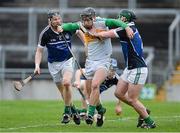 16 March 2014; Dan Currams, Offaly, in action against Wayne McNamara, left, and Stephen Walsh, Limerick. Allianz Hurling League, Division 1B, Round 4, Offaly v Limerick, O'Connor Park, Tullamore, Co. Offaly. Picture credit: Ramsey Cardy / SPORTSFILE