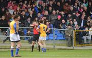 16 March 2014: Referee Niall Cullen shows Longford's Colm Smyth the red card for a challenge on Cavan's Martin Reilly. Allianz Football League Division 3, Round 5, Longford v Cavan, Pearse Park, Longford. Picture credit: Ray Lohan / SPORTSFILE