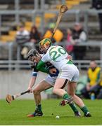 16 March 2014; David Reidy, Limerick, in action against Ger Healion, Offaly. Allianz Hurling League, Division 1B, Round 4, Offaly v Limerick, O'Connor Park, Tullamore, Co. Offaly. Picture credit: Ramsey Cardy / SPORTSFILE