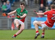 16 March 2014; Cillian O'Connor, Mayo, beats Michael Shields, Cork to score his side's fourth goal. Allianz Football League, Division 1, Round 5, Mayo v Cork, Elverys MacHale Park, Castlebar, Co. Mayo. Picture credit: David Maher / SPORTSFILE