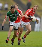 16 March 2014; Michael Shields, Cork, in action against Kevin McLoughlin, Mayo. Allianz Football League, Division 1, Round 5, Mayo v Cork, Elverys MacHale Park, Castlebar, Co. Mayo. Picture credit: David Maher / SPORTSFILE