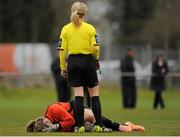 16 March 2014; Referee Paula Brady checks on Monica McGuirk, Peamount United, after she collided with Siobhan Killeen, Raheny United, not pictured. Bus Éireann Women's National League, Peamount United v Raheny United, Greenogue, Newcastle, Dublin. Picture credit: Piaras Ó Mídheach / SPORTSFILE