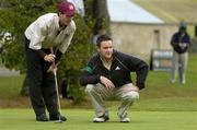 16 September 2005; Sean O'Flaherty, and his caddy Mark Canavan, Hermitage Golf Club, line up a putt on the 2nd during the Senior Cup Semi-Final. Bulmers Cups and Shields Finals, Rosslare Golf Club, Rosslare, Wexford. Picture credit; Ray McManus / SPORTSFILE