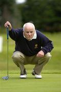 16 September 2005; Dermot Morris, Limerick Golf Club, lines up a putt on the 2nd during the Senior Cup Semi-Final. Bulmers Cups and Shields Finals, Rosslare Golf Club, Rosslare, Wexford. Picture credit; Ray McManus / SPORTSFILE