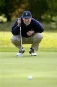 16 September 2005; Ger Vaughan, Limerick Golf Club, watches his birdie putt on the 2nd during the Senior Cup Semi-Final. Bulmers Cups and Shields Finals, Rosslare Golf Club, Rosslare, Wexford. Picture credit; Ray McManus / SPORTSFILE