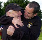 15 September 2005; Noel Flanagan, left, Castleblayney Golf Club, is congratulated, on the 18th green, by his team captain Brian Coleman after the Pierce Purcell Shield Final. Bulmers Cups and Shields Finals, Rosslare Golf Club, Rosslare, Wexford. Picture credit; Ray McManus / SPORTSFILE