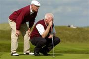 15 September 2005; Brian Hanrahan, Castletroy Golf Club, and his caddy Breen Hurley line up a putt on the 13th green during the Pierce Purcell Shield Final. Bulmers Cups and Shields Finals, Rosslare Golf Club, Rosslare, Wexford. Picture credit; Ray McManus / SPORTSFILE