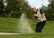 17 September 2005; Damien McGrane, plays from a bunker onto the 14th green during the Irish PGA Championship at the Irish PGA National. Palmerstown House, Johnston, Co. Kildare. Picture credit; Matt Browne / SPORTSFILE
