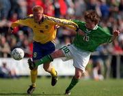 27 April 1999; Alan Mahon of Republic of Ireland in action against Marcus Vaapil of Sweden during the U21 International friendly match between Republic of Ireland and Sweden at Birr Town FC in Birr, Offaly. Photo By Brendan Moran/Sportsfile