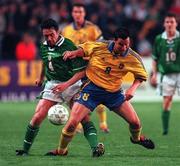 28 April 1999; Alan McLoughlin of Republic of Ireland in action against Daniel Andersson of Sweden during the International friendly match between Republic of Ireland and Sweden at Lansdowne Road in Dublin. Photo By Brendan Moran/Sportsfile